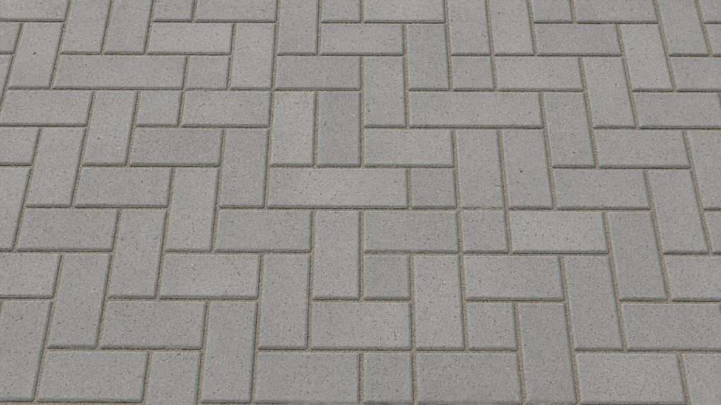Close-up of clean herringbone pavers in San Diego