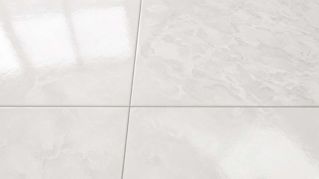 Close-up of clean white polished porcelain tile with tight grout lines